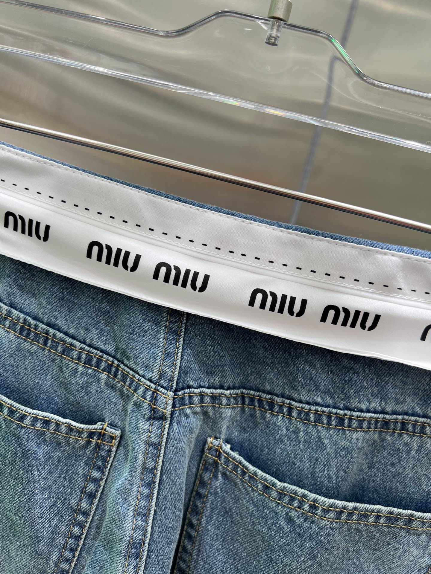0528 Jeans with logo on waist